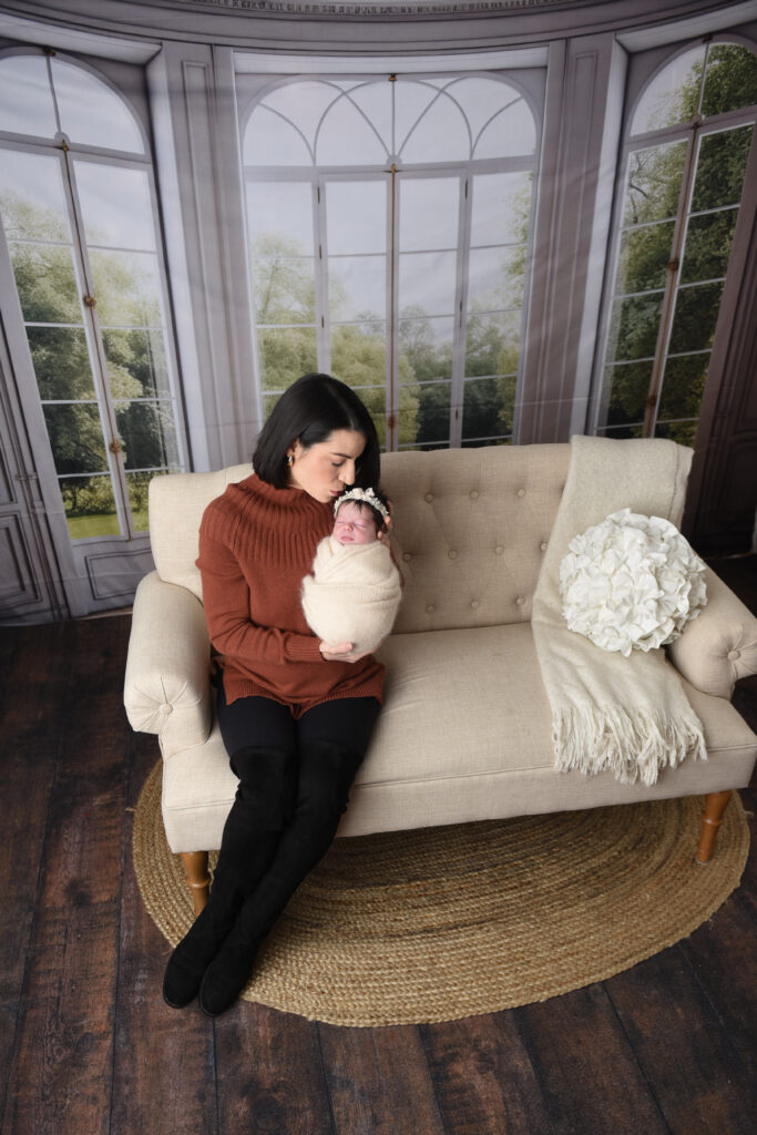 Mom sweet moments with her sweet baby girl, all wrapped up nice and snuggly, during my lifestyle portion of this newborn session  