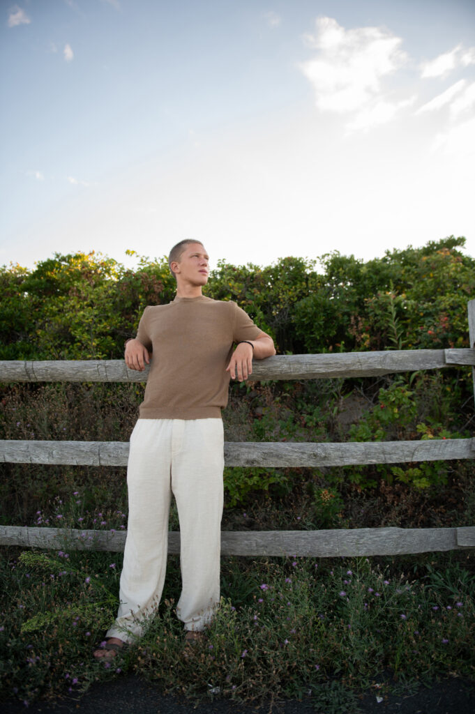 Senior photo relaxing along the shoreline at Meigs Point, Hammonasset Beach State Park, Madison CT
