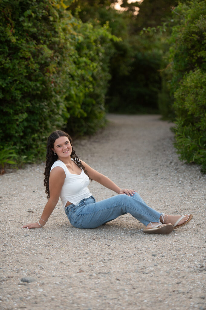 Senior session on the path  at Meigs Point, Hammonasset Beach State Park, Madison CT during golden light 