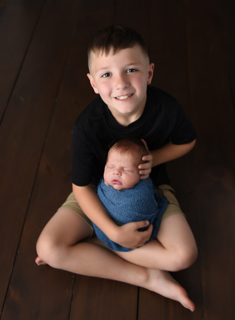 Proud Big Brother at newborn session in Wallingford CT 