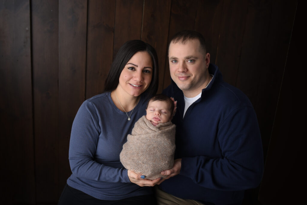 mom , dad and sweet new baby 
